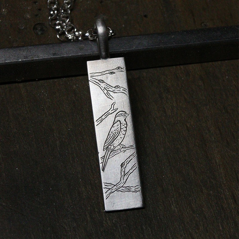 Pendentif gravé Oiseau